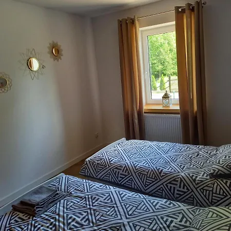1 Nad Rzeka Krutyn Apartamento